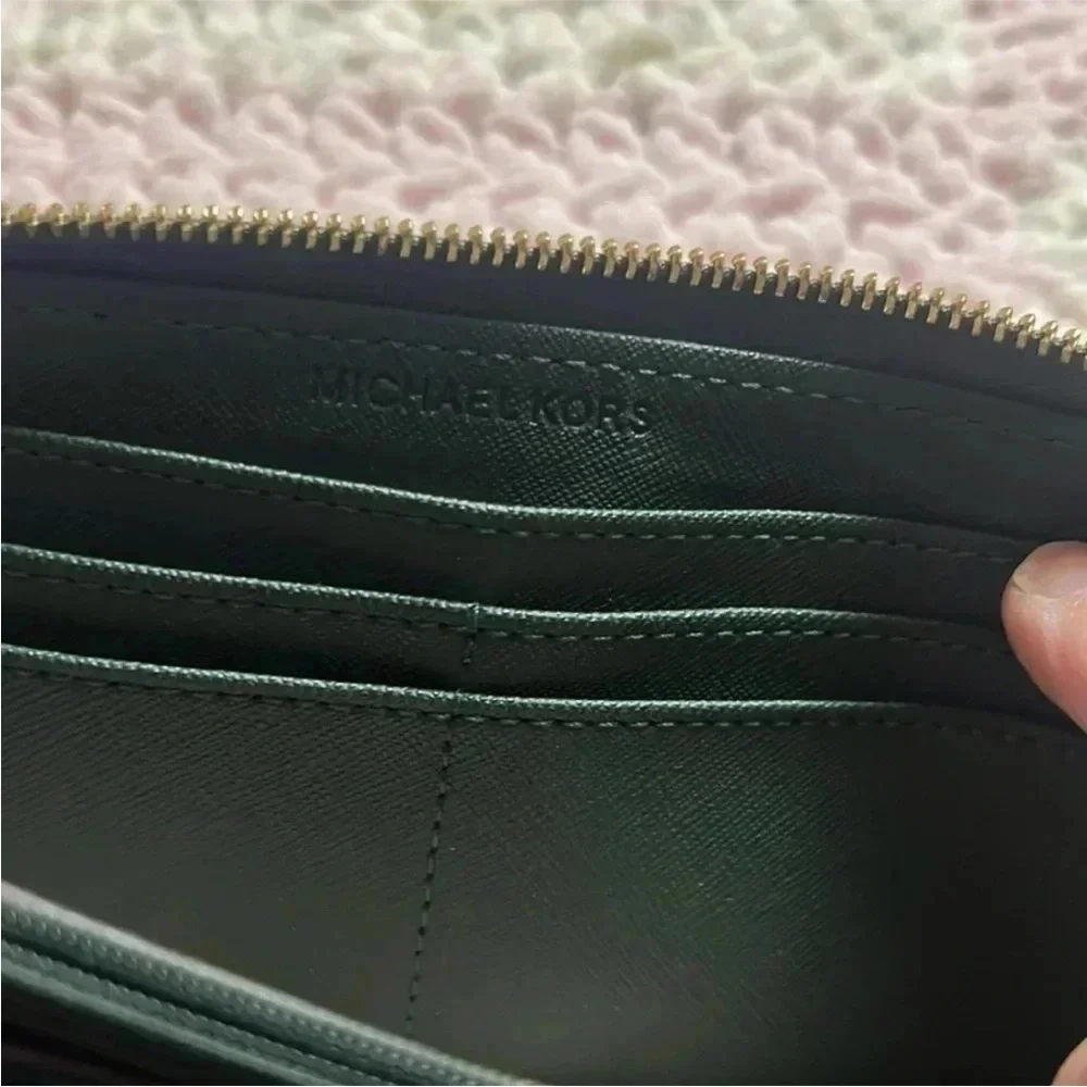 - Michael Kors green large wallet